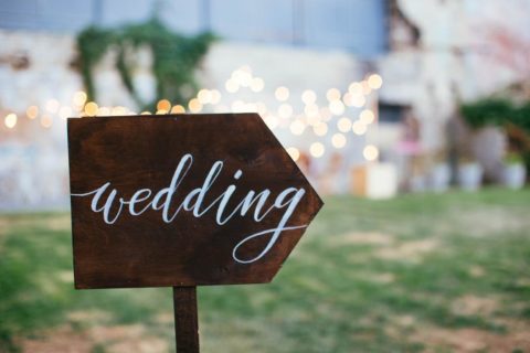 Wedding and party place decoration with wooden sign