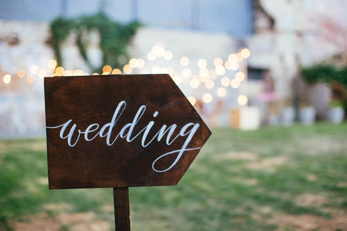 Wedding and party place decoration with wooden sign