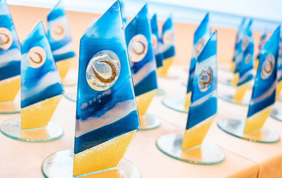 Sail designed glass trophies with CTA logo