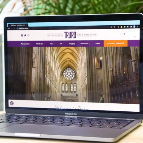 Visit Truro website homepage on a MacBook Pro