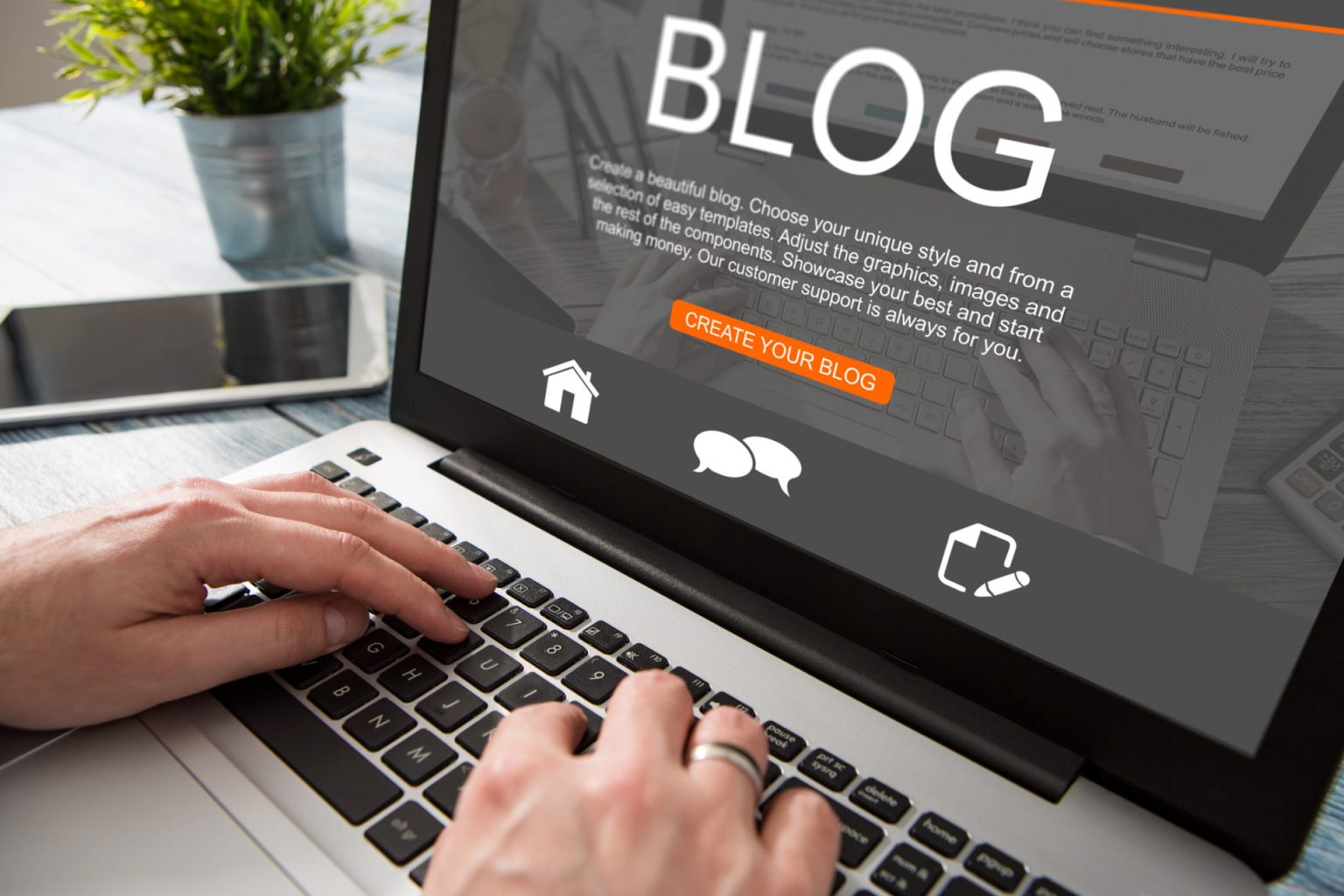 Close up of a man using a laptop, the word BLOG is written across the screen in white font