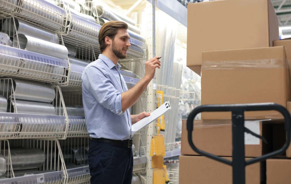 Manager use his tablet for online checking products available.